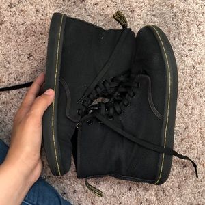 Doc Marten’s high top canvas shoes